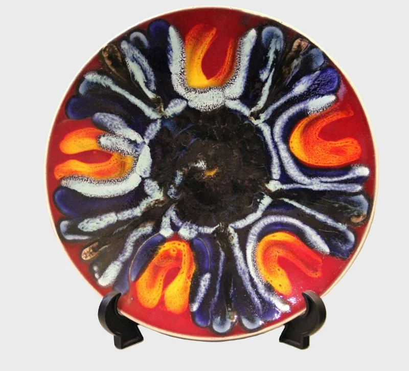 Poole bord (1) - Porselein › Borden - €95.00 - Gemerkt Poole
26.5cm diameter
Ca 1970