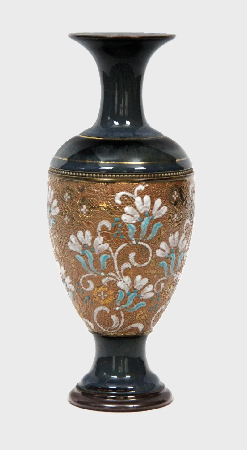 Royal doulton vaasje (1) - Porselein › Vazen - €165.00 - Gemerkt Royal Doulton
Datummerk 1902-1932
23cm hoog