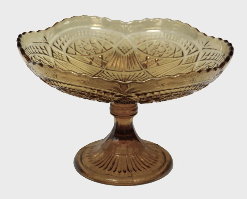 Schaal op voet, geel geperst glas - Glas › Schalen - 28.5cm diameter, 19cm hoog
Fruitschaal
1930-1950