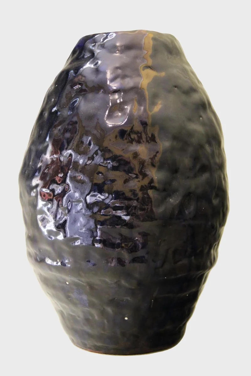 Vintage vaas (2) - Porselein › Vazen - €65.00 - Vintage vaas in ceramiek met blauw-zwart glazuur.
25cm hoog